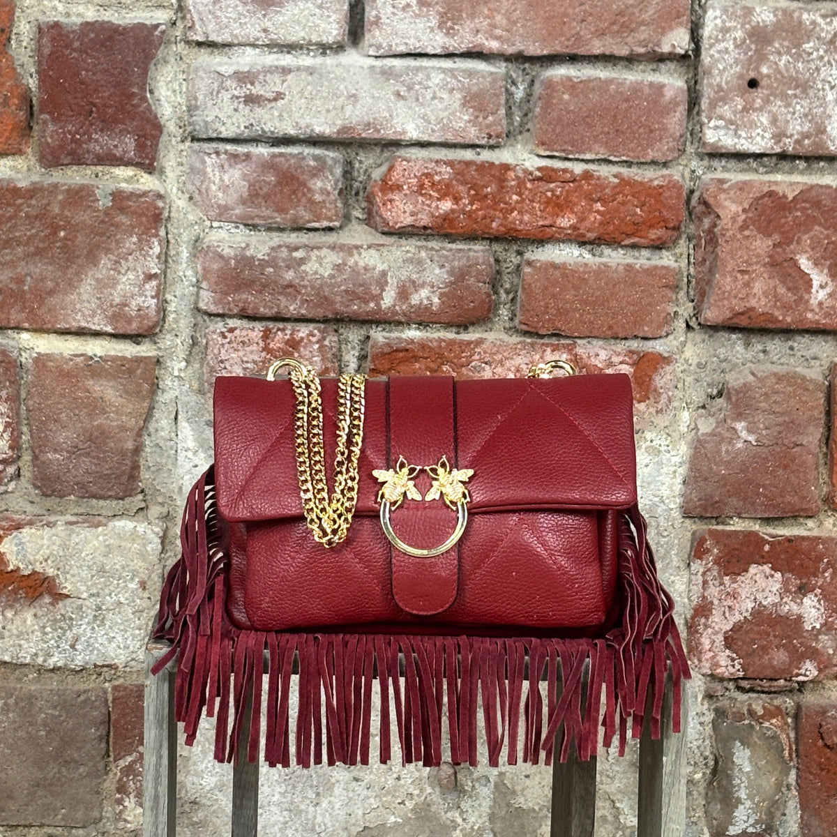 Borsa Api Rosso