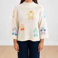Maglione con fiori manica ampia beige